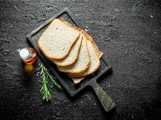 Poster - Pieces of fresh bread with rosemary.