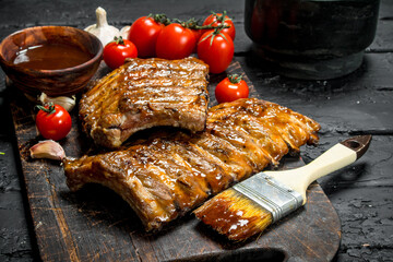 Wall Mural - Grilled ribs with sauce.