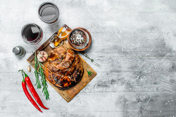 Canvas Print - Big grilled pork steak with red wine.