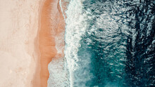 Aerial Drone Overhead Shot Of Beach With No People, Blue Water, Waves, Sunny Day