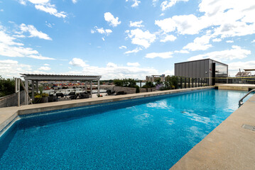 Luxury modern apartment in condominium in Montreal perfectly staged and furnished with amentinites common areas swimming pool, rooftop, terrace, gym, garden and city views