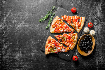 Wall Mural - Slices of Mexican pizza with tomatoes, olives and rosemary.