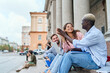 © yurolaitsalbert - group of students sitting on the steps
