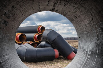 Wall Mural - Insulated pipe. Large metal pipes with a plastic sheath at a construction site. Modern pipeline for supplying hot water and heating to a residential area. Close-up.