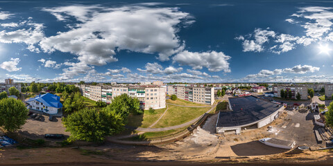 Wall Mural - aerial full seamless spherical 360 hdri panorama view in city overlooking of residential area of high-rise buildings in equirectangular projection.