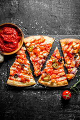 Canvas Print - Mexican pizza with rosemary and tomato paste in bowl.