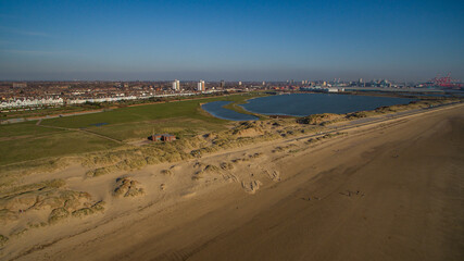 Wall Mural - Drone photo of Crosby lake and Crosby beach, Liverpool, UK