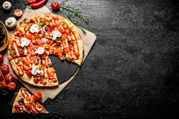 Canvas Print - Fragrant sliced Mexican pizza with mushrooms and tomatoes.