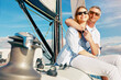 Wealth, rich and couple vacation on a yacht at sea as retirement investment feeling happy, excited and enjoying travel holiday. Luxury, romantic and joyful baby boomers on an anniversary boat cruise