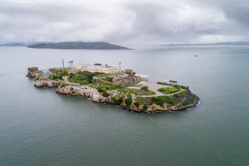 Wall Mural - Aerial view of Alcatraz island in the San Francisco Bay. USA. The most famous Alcatraz Prison, Jail. Sightseeing Place. San Francisco Cityscape in Background. Drone