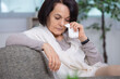 © auremar - sad stressed old middle aged woman widow mourning