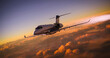 © Franco Ercolino - A luxury private jet overflying cloudy skies at sunset