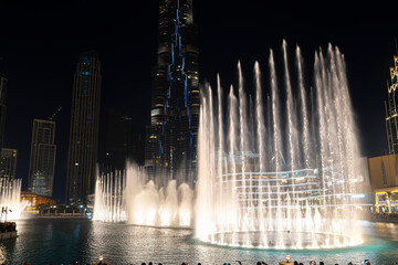 Wall Mural - Dancing fountain show. Magical view night. Tourist attraction. Luxury travel inspiration.