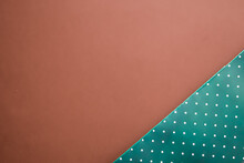 Abstract Green Polka Dot Background On Brown Backdrop.