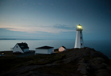 The Coastline And A Lighthouse From Cape Spear Near St. Johns, Newfoundland, Canada.