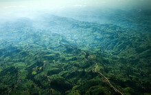 Aerial Landsape Shot Of Green Kenyan Foothills.