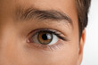© Pixel-Shot - Little boy with brown eyes on white background, closeup