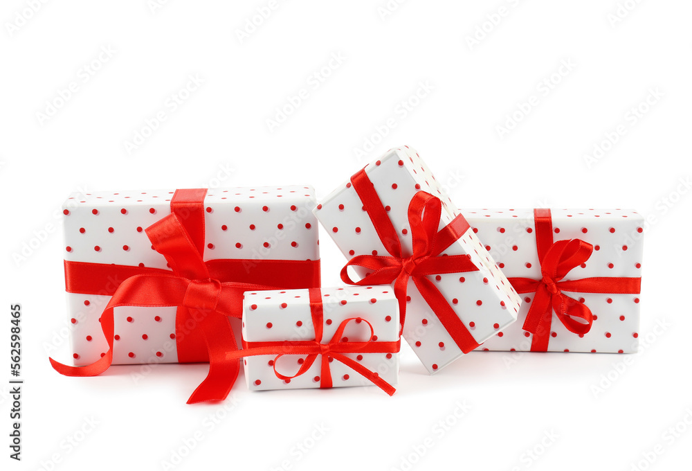 Gift boxes with red satin ribbon isolated on white background. Valentine's Day celebration