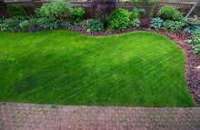 Beautiful Yard Ready For Planting Of Spring Flowers.