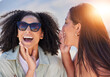 © Jessica L J/peopleimages.com - Girl friends, whisper and happy communication of a woman with a secret laughing outdoor. Lens flare, friend conversation and summer holiday travel of people talking about a gossip story on vacation