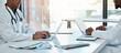 © Malik E/peopleimages.com - Healthcare, laptop and doctors in meeting room planning surgery schedule at table in hospital boardroom. Teamwork, clinic and innovation in medical research, happy men in medicine working together.