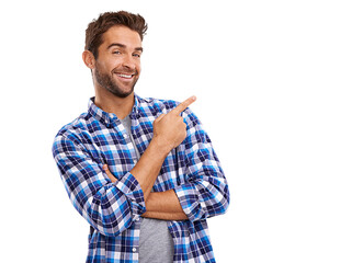 a studio shot of a handsome man pointing to copyspace isolated on a png background.
