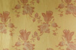 Old torn wallpaper on the wall.Old wallpaper for texture or background.