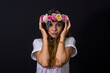 Nice low key portrait of beautiful Ukrainian young woman  in flower diadem