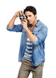 © peopleimages.com - A handsome young man taking a picture with his camera Isolated on a PNG background.