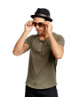 © peopleimages.com - A trendy young man putting on sunglasses Isolated on a PNG background.