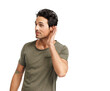 © peopleimages.com - A handsome young man cupping his hand behind his ear to hear better Isolated on a PNG background.