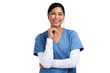 © peopleimages.com - Portrait of a young beautiful doctor in scrubs against Isolated on a PNG background.