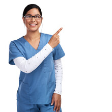 Portrait Of A Young Doctor Wearing Glasses And Scrubs, Pointing To Her Left Isolated On A PNG Background.