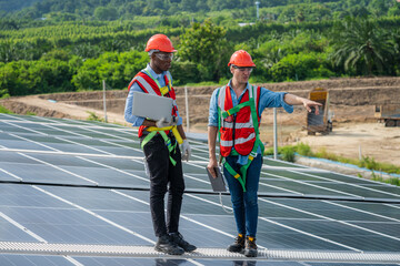 Wall Mural - Electrical and instrument technician installation and maintenance electric system solar panel on the roof of factory,Service check installation solar cell.