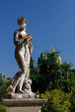 He Palace Of The Empress Elisabeth Sissi Of Austria, Known As The Achilleion Palace, Is Home To A Striking Statue Of Aphrodite Holding A Dove. This Sculpture Can Be Found On The Grounds Of The Palace 