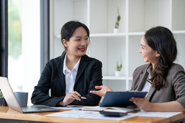 business idea creative brainstorming sessions for projects strategic topic of two asian girls workin