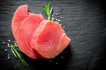 Wall Mural - Fresh raw tuna steak with rosemary.