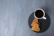 Breakfast On Valentine's Day Coffee And Biscuits Heart On A Tray Black On A Gray Background With A Place For Text Copyspace. Food Romantic Surprise