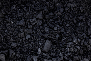 natural black coals for background. industrial coals. heap of black coal, closeup view. mineral depo