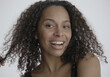 © supamotion - CU Headshot portrait of beautiful 20s African-American Black female posing against white background, no make-up, clean skin. Shot with ARRI Alexa Mini LF