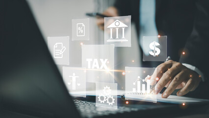 Busines using a computer to complete Individual income tax return form online for tax payment. Government, state taxes. Data analysis, paperwork, financial research, report. tax return...