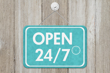 Wall Mural - Open 24/7 message on a sign on weathered wood