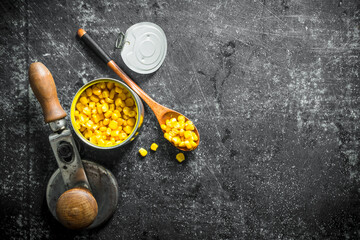 Wall Mural - Canned corn in a tin can and a spoon.