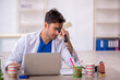 © Elnur - Young male dentist working in the clinic