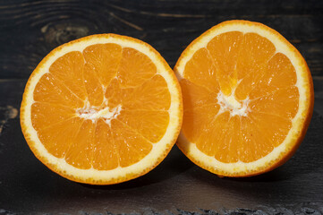 Wall Mural - Sicilian sweet juicy yellow navel oranges close-up