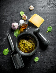 Wall Mural - Pesto sauce with olive oil, Parmesan and garlic.