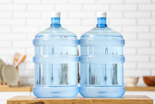 Bottles Of Clean Water On Counter In Kitchen