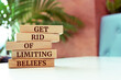 © Uuganbayar - Wooden blocks with words 'Get Rid Of Limiting Beliefs'.