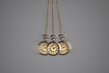 Hypnosis Session. Vintage Pocket Watch With Chain Swinging On Grey Background, Motion Effect