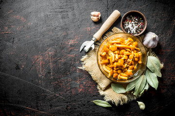 Poster - Pickled mushrooms on an old bag of Bay leaves.